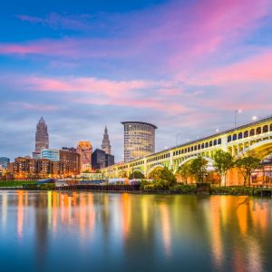 Cleveland, Ohio, USA downtown city skyline on the Cuyahoga River at twilight.