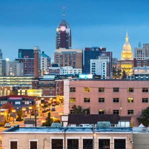 Lansing, Michigan, USA downtown city skyline at twilight.