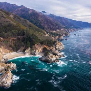 Arial View Of California Coastline Under Cloudy Skies