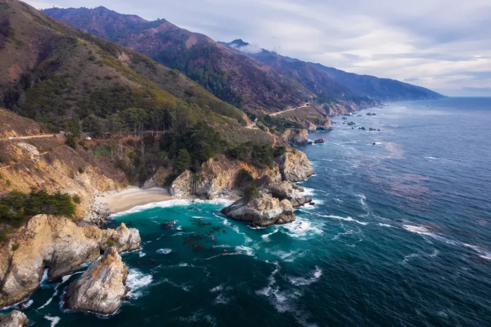 Arial View Of California Coastline Under Cloudy Skies